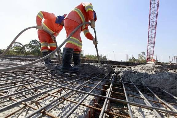Concrete pouring over rebar mesh