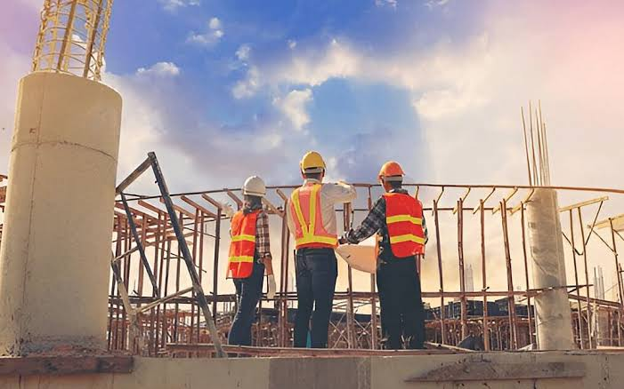 Workers on reinforced concrete platform